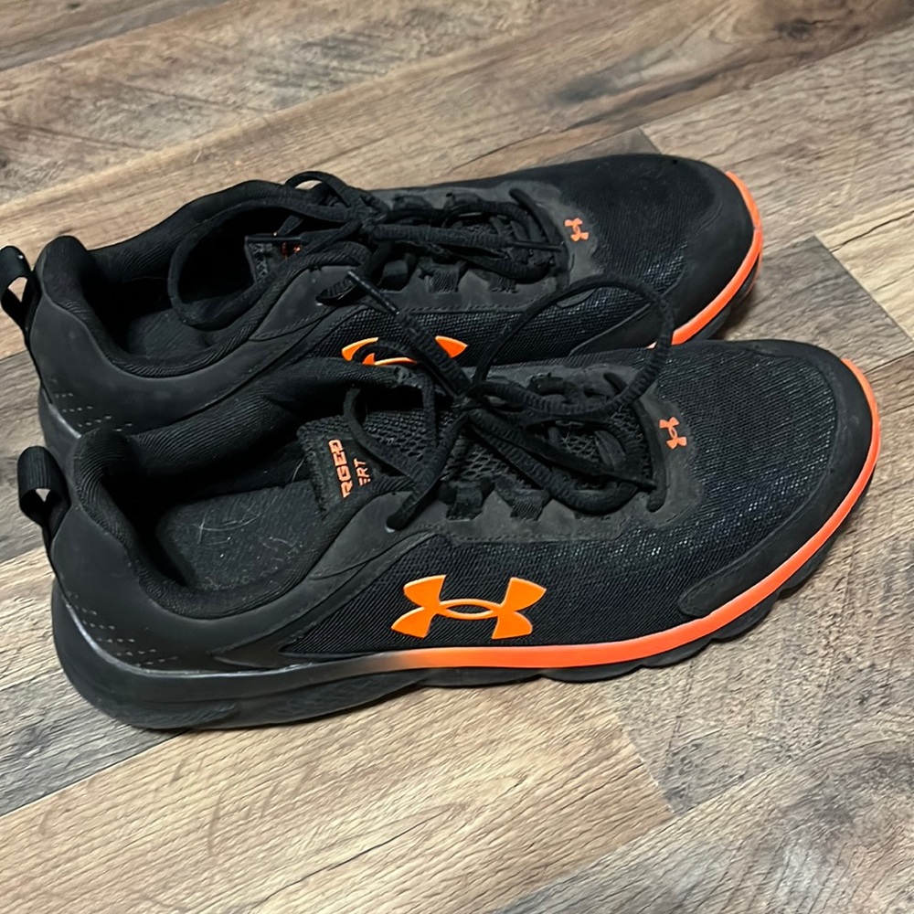 Men’s black with neon orange Under Armour shoes, size 10.5